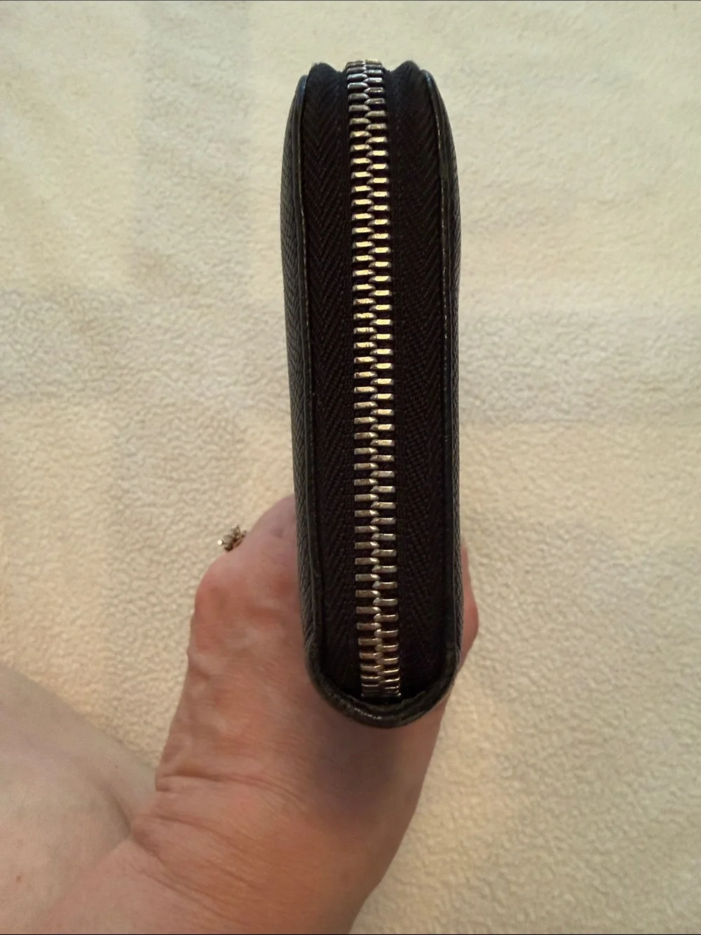 Bvlgari Zip-Around Black Leather wallet with blue interior.